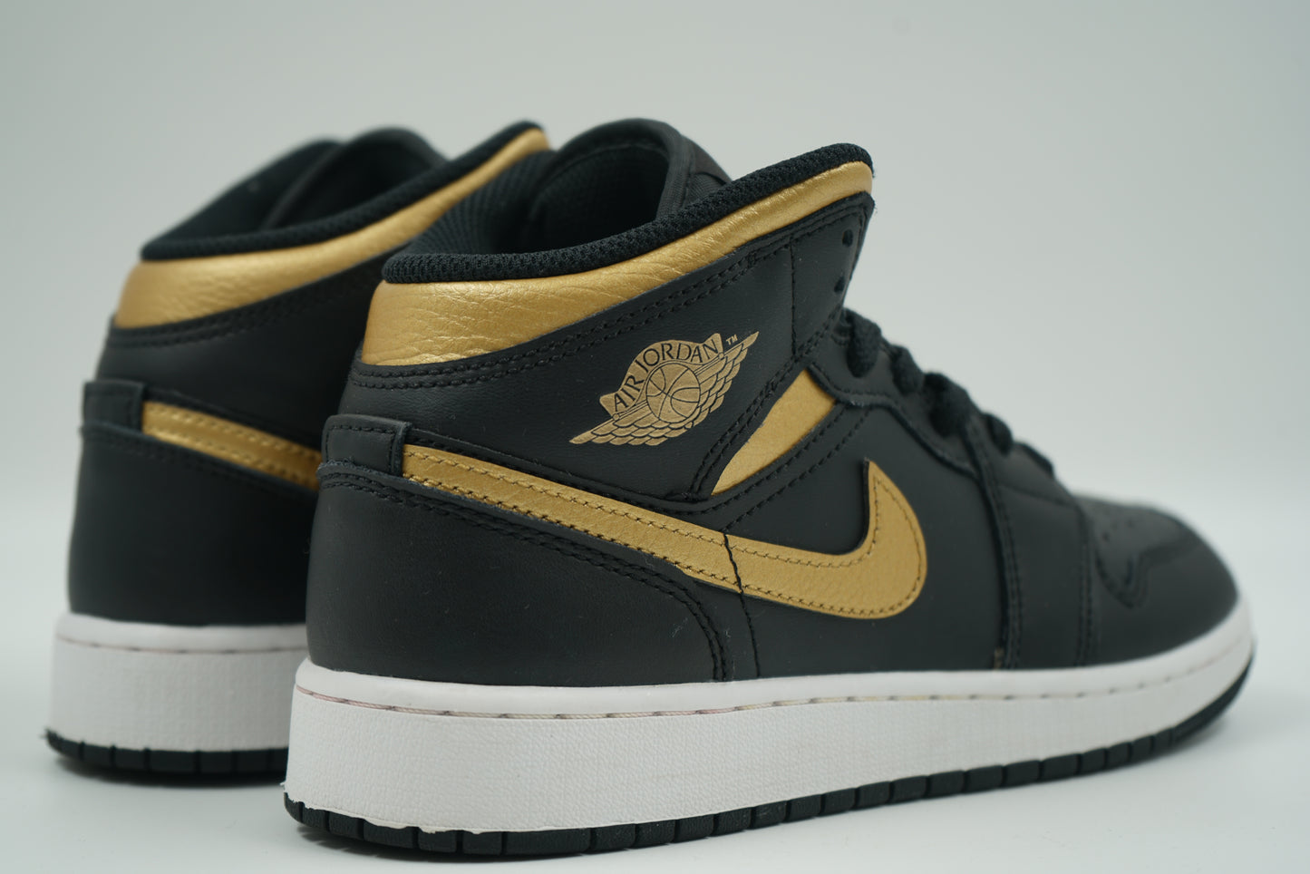 Air Jordan 1 Mid Black Metallic Gold