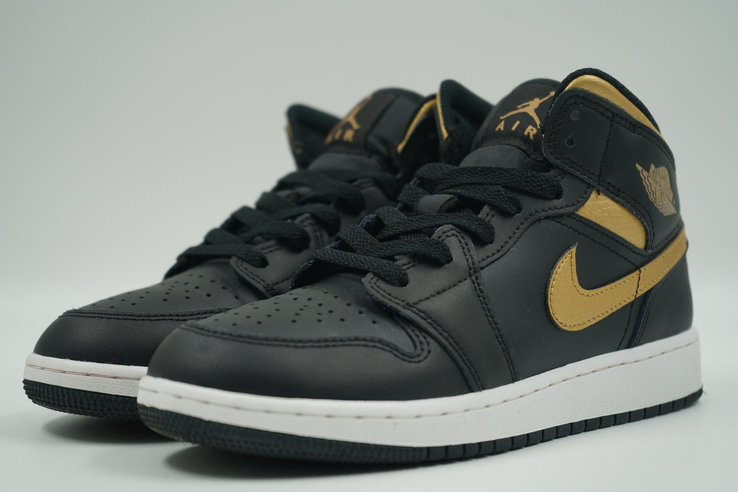 Air Jordan 1 Mid Black Metallic Gold