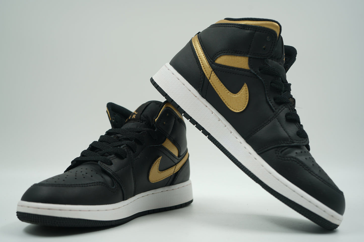 Air Jordan 1 Mid Black Metallic Gold