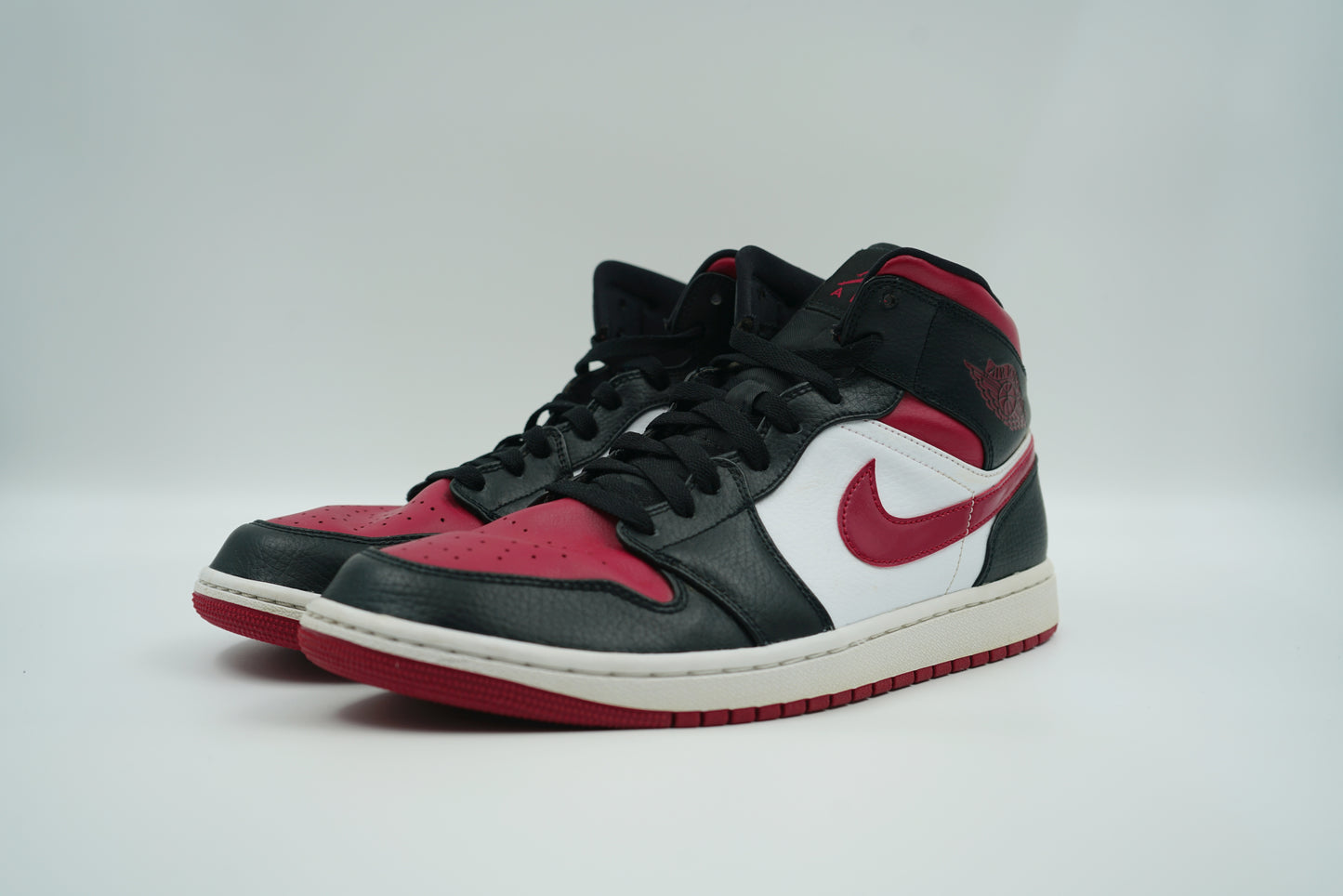 Air Jordan 1 Mid Noble Red