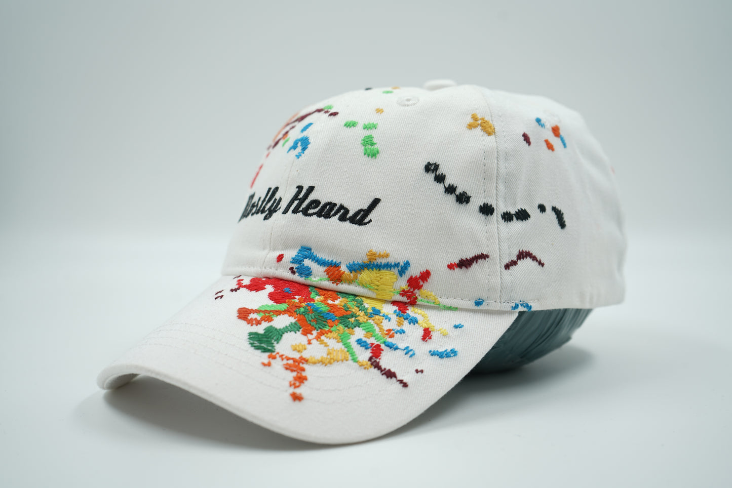 Mostly Heard Rarely Seen Multi Color White Cap