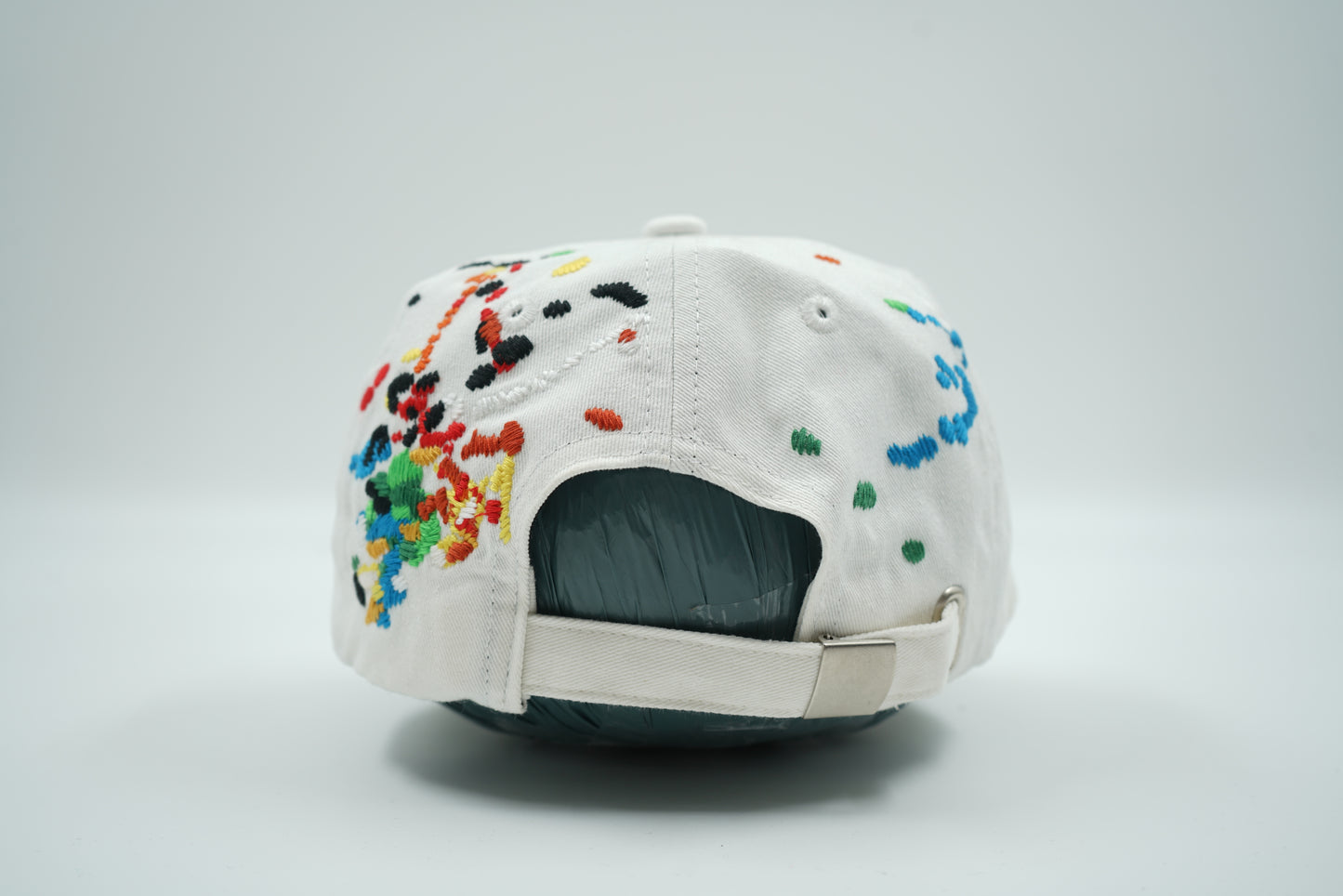 Mostly Heard Rarely Seen Multi Color White Cap
