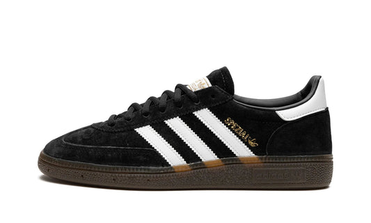 Adidas Handball Spezial sneakers featuring a premium black suede upper and vintage gum sole (DB3021). The terrace classic available at our Malmö store or online.