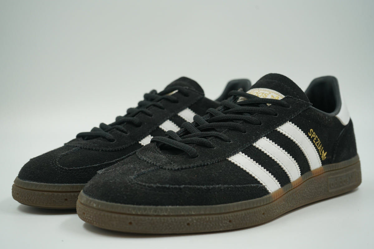 Pre-owned adidas Handball Spezial in black suede with white stripes and gum sole, front view