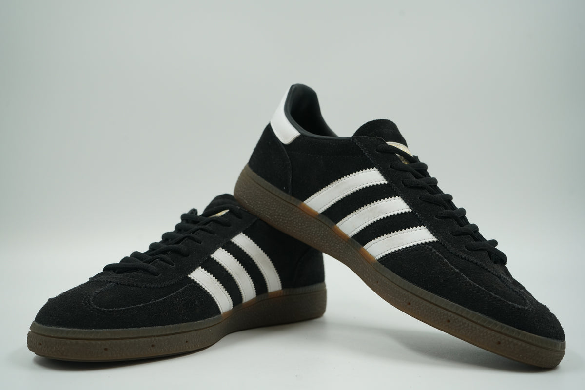 Pre-owned pair of adidas Handball Spezial in black suede with white stripes and gum sole