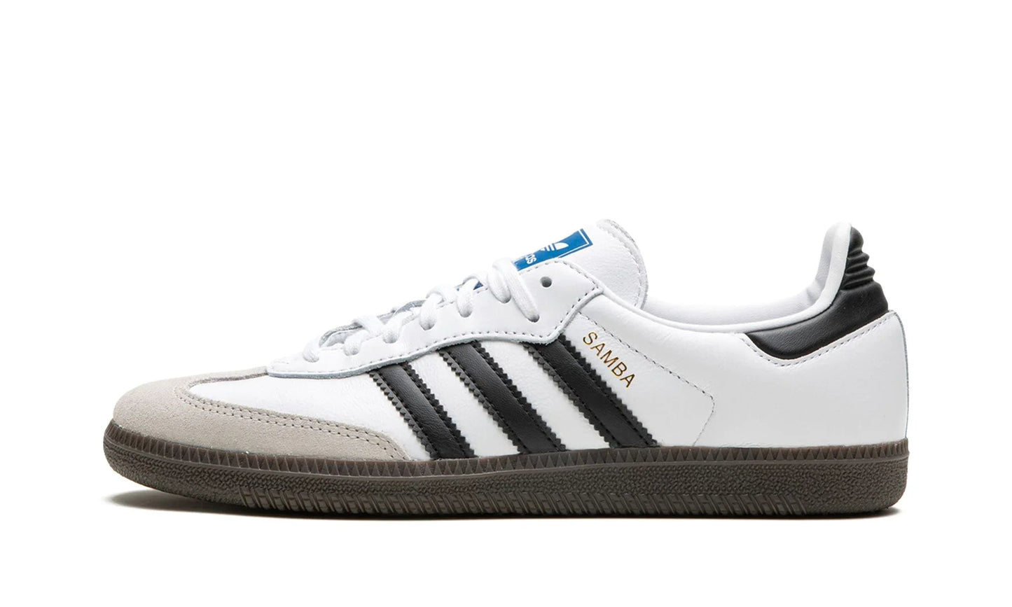 The iconic Adidas Samba OG in White and Core Black (b75806) with a suede T-toe and gum rubber sole. Available at our Malmö store or online.