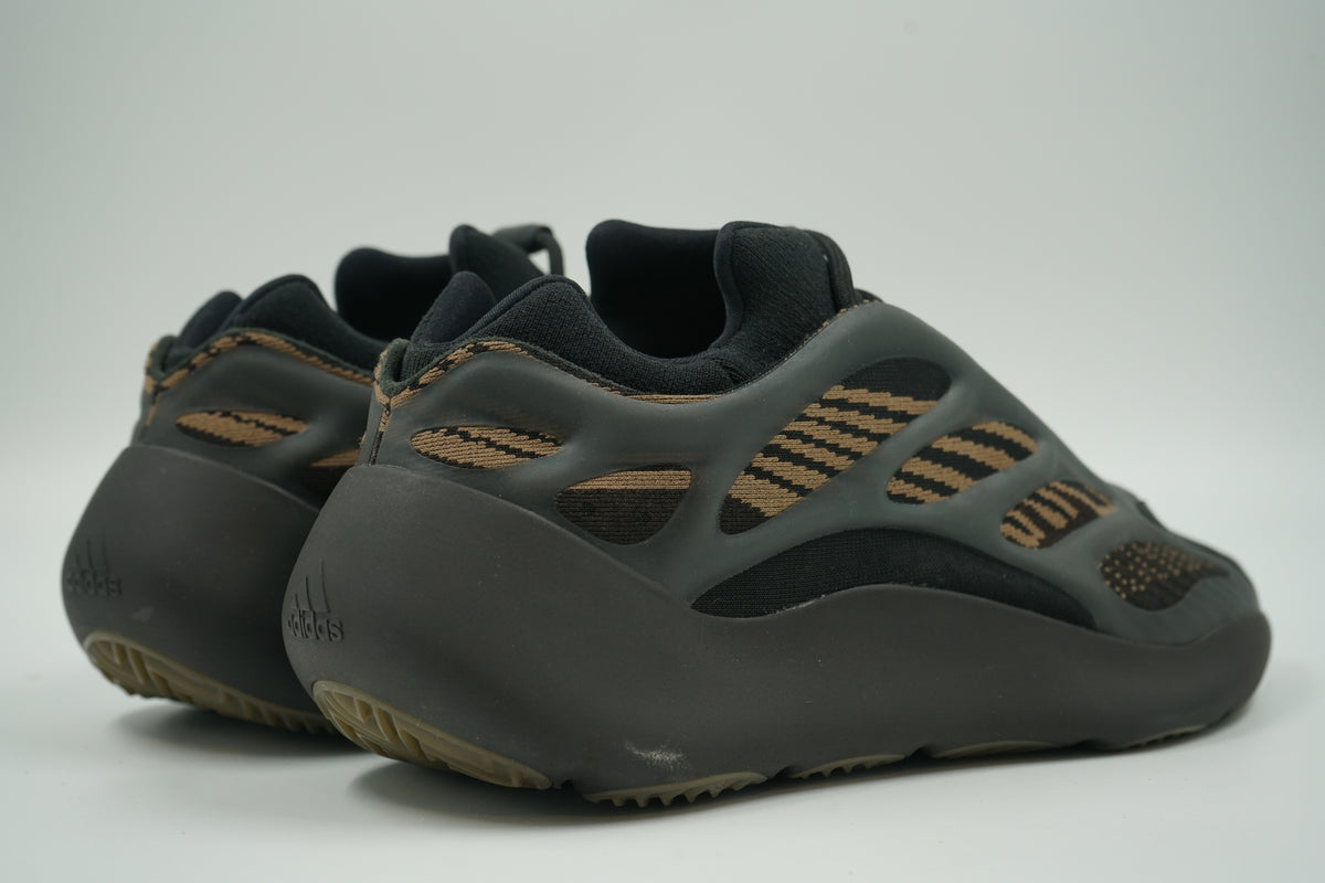 Pre-owned adidas Yeezy 700 V3 Clay Brown with embossed adidas logo on brown heel midsole, rear view