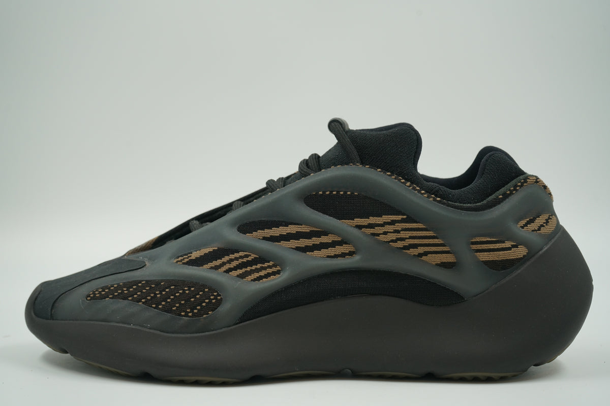 Pre-owned adidas Yeezy 700 V3 Clay Brown with black translucent cage over brown knit upper, side view
