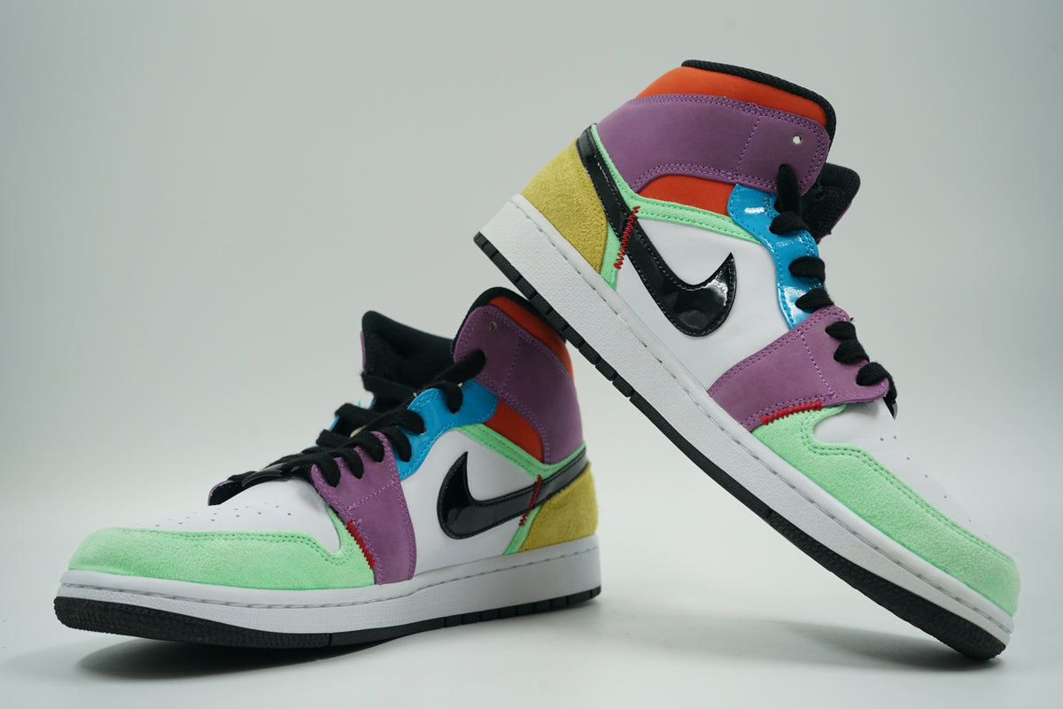 Pair of pre-owned women’s Air Jordan 1 Mid SE Lightbulb in multicolour patchwork, stacked view of inner sides