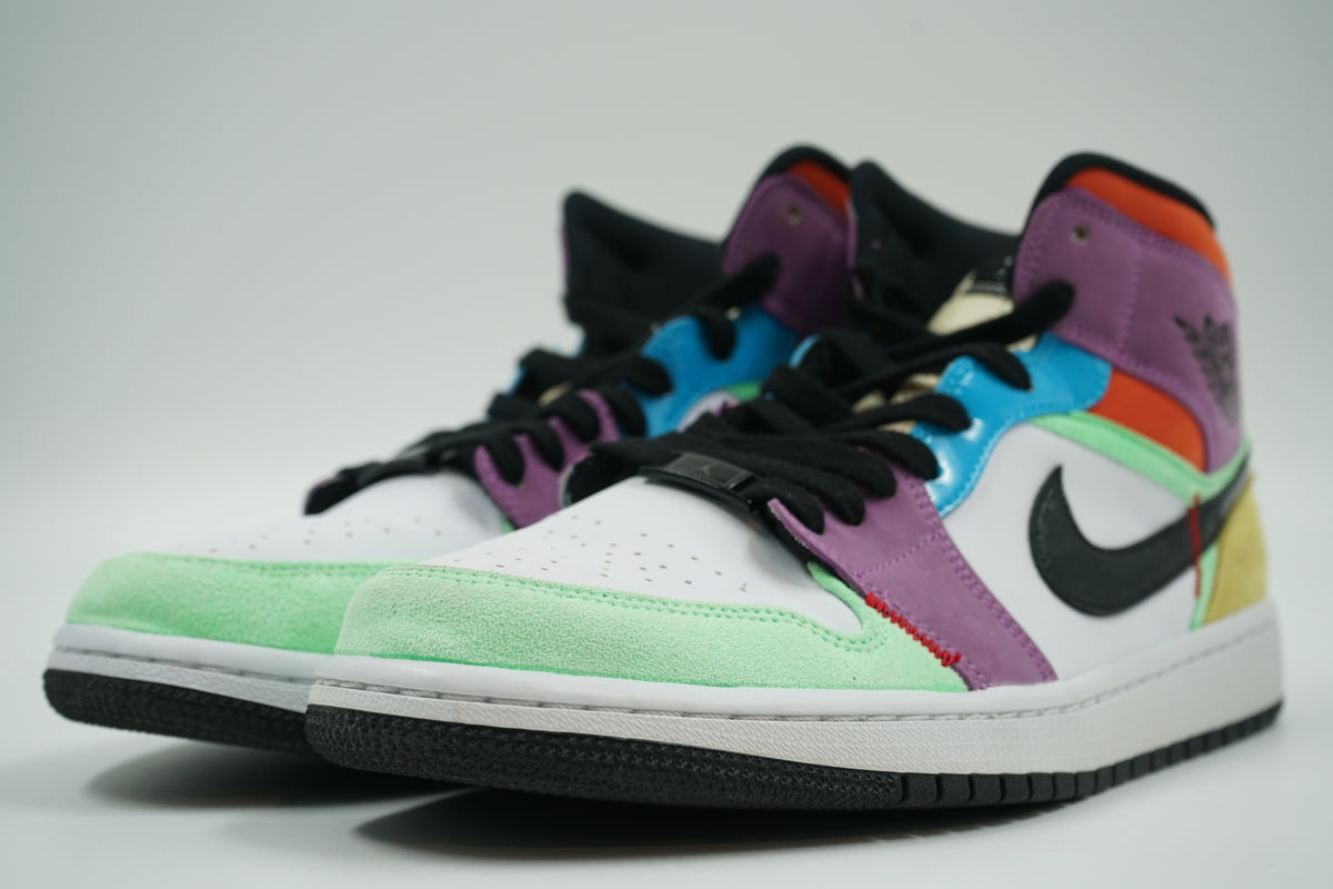 Pair of pre-owned women’s Air Jordan 1 Mid SE Lightbulb in multicolour suede and patent, front angle view