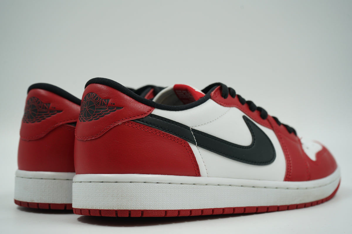 Pair of pre-owned Air Jordan 1 Retro Low OG Chicago 2025, back view with black Wings logo on red heel