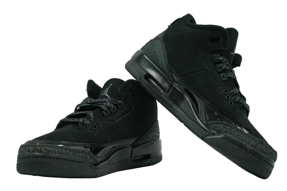Pair of brand new Air Jordan 3 Retro Black Cat (2025) (GS) in all-black nubuck and patent leather