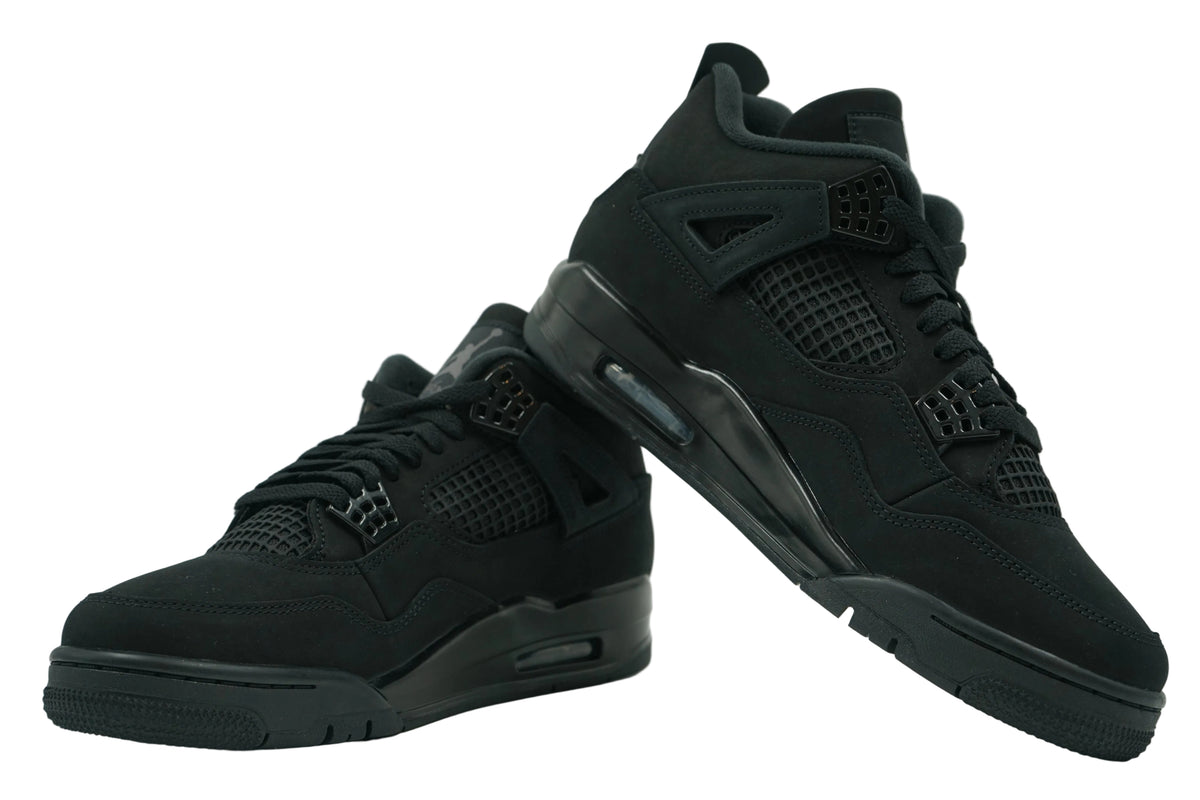 Brand new pair of Air Jordan 4 Black Cat 2025 in all-black nubuck with visible Air unit, side view