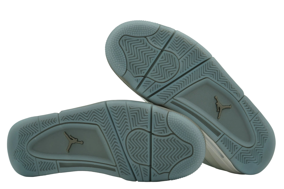 Outsoles of brand new Air Jordan 4 Retro Photon Dust Blue Chill (GS) HV4401-014