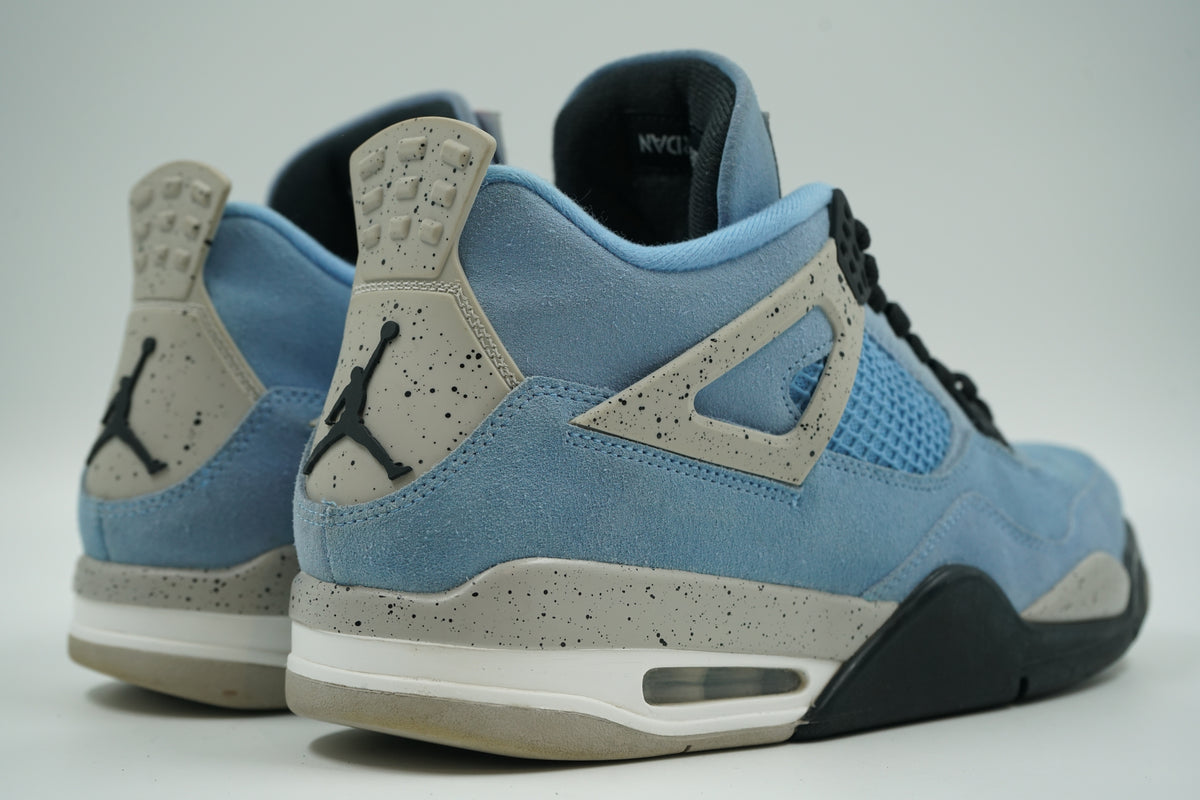 Pair of pre-owned Air Jordan 4 Retro University Blue, back view with speckled heel tabs and black Jumpman