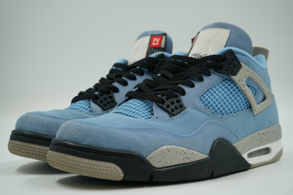 Pair of pre-owned Air Jordan 4 Retro University Blue in blue suede with black laces, front angle view