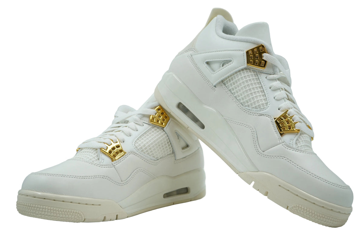 Brand new pair of women's Air Jordan 4 Metallic Gold in sail leather with gold eyelets, side view