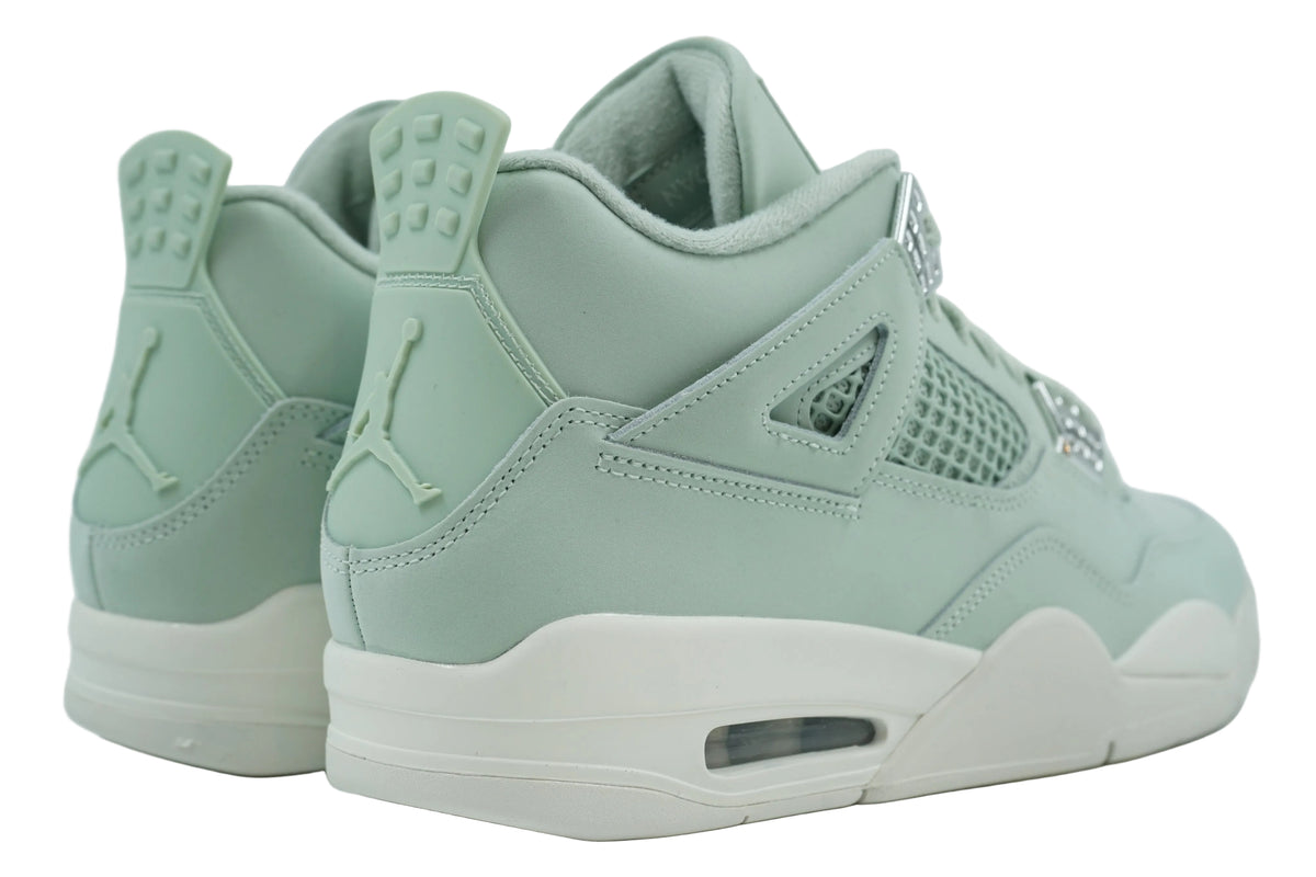 Brand new women's Air Jordan 4 Seafoam with tonal mint heel tab, embossed Jumpman and Air unit, rear view