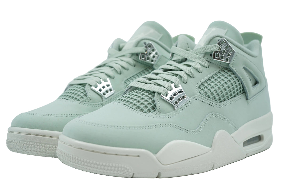 Brand new pair of women's Air Jordan 4 Seafoam in mint green nubuck with metallic silver eyelets, front view