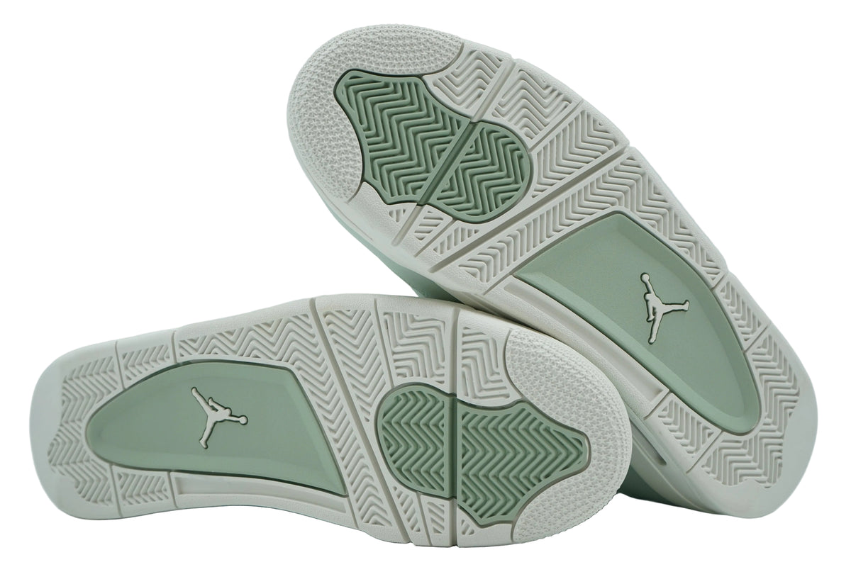 Unworn sail outsoles of women's Air Jordan 4 Seafoam with mint green panels and white Jumpman logo