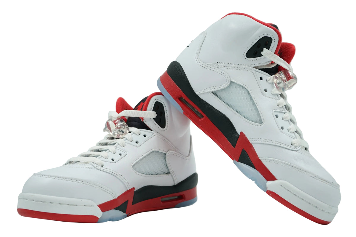 Pair of brand new Air Jordan 5 Retro Fire Red Black Tongue (2025) (GS) in white, Fire Red and black