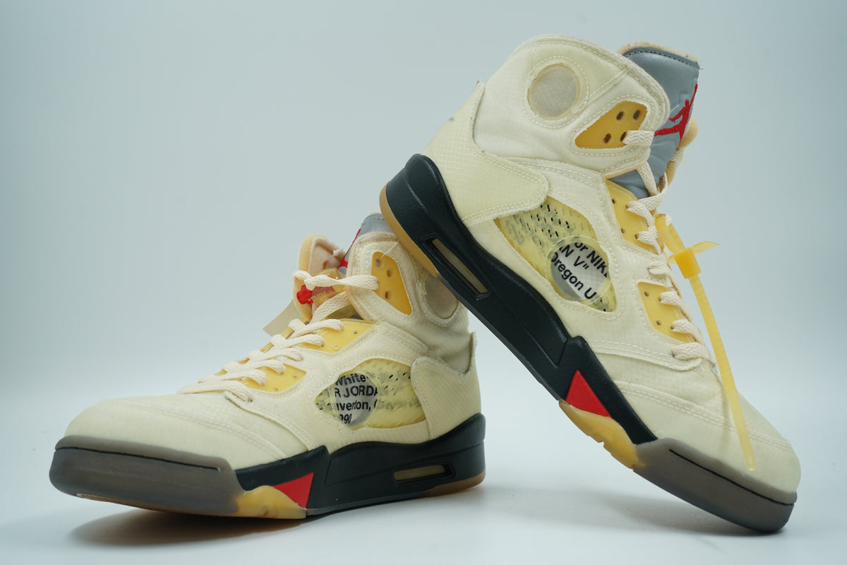 Pair of pre-owned Air Jordan 5 SP Off-White Sail with translucent cutouts and Fire Red accents