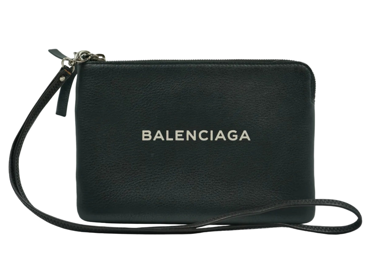 Pre-owned Balenciaga logo leather pouch in black with white logo print and long strap, front view