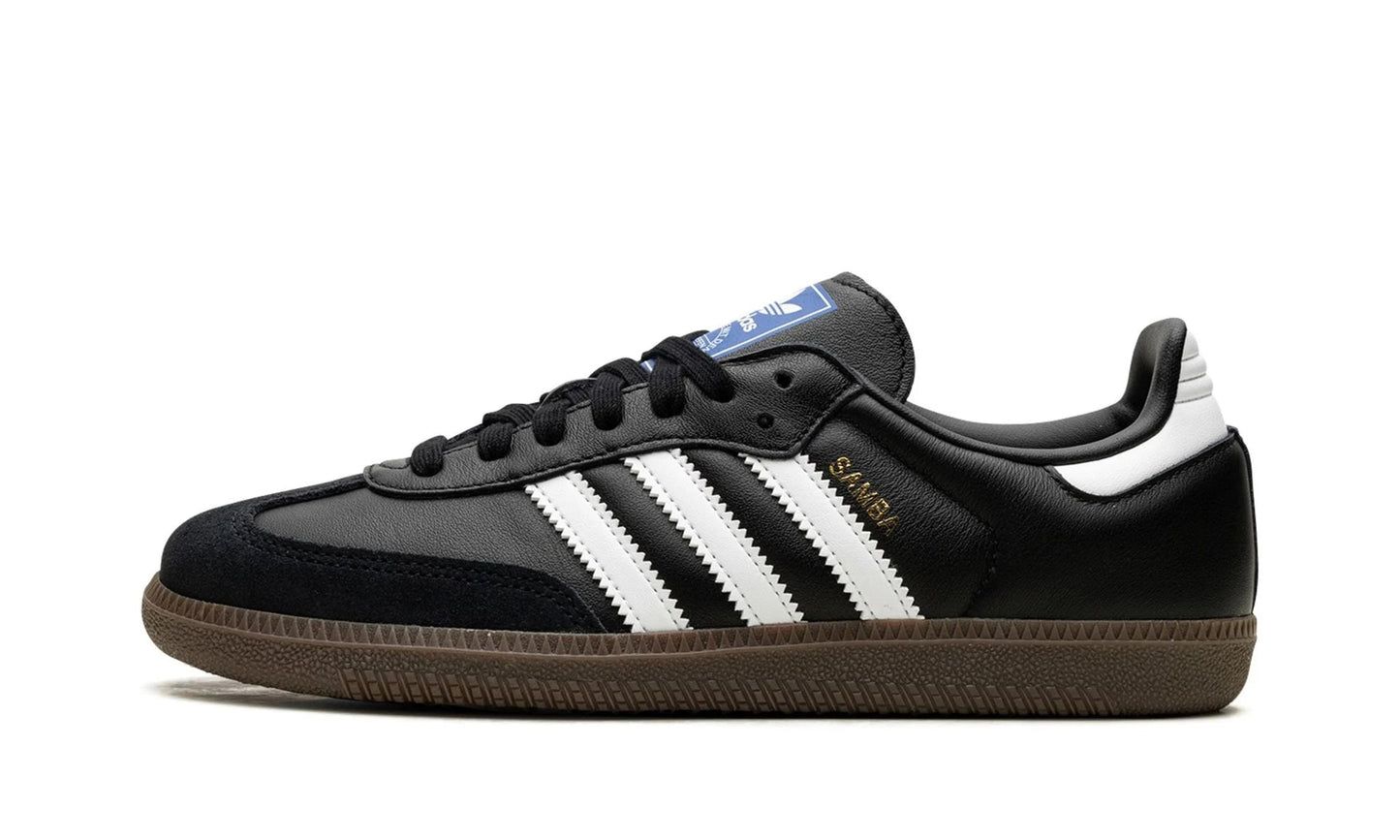 Classic Adidas Samba OG Black Gum (B75806) featuring core black leather, white stripes, and a gum rubber sole. Available at our Malmö store