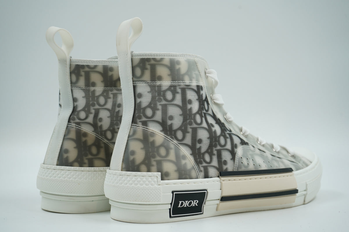 Pair of pre-owned Dior B23 high-top sneakers in Dior Oblique canvas, back view with heel pull loops