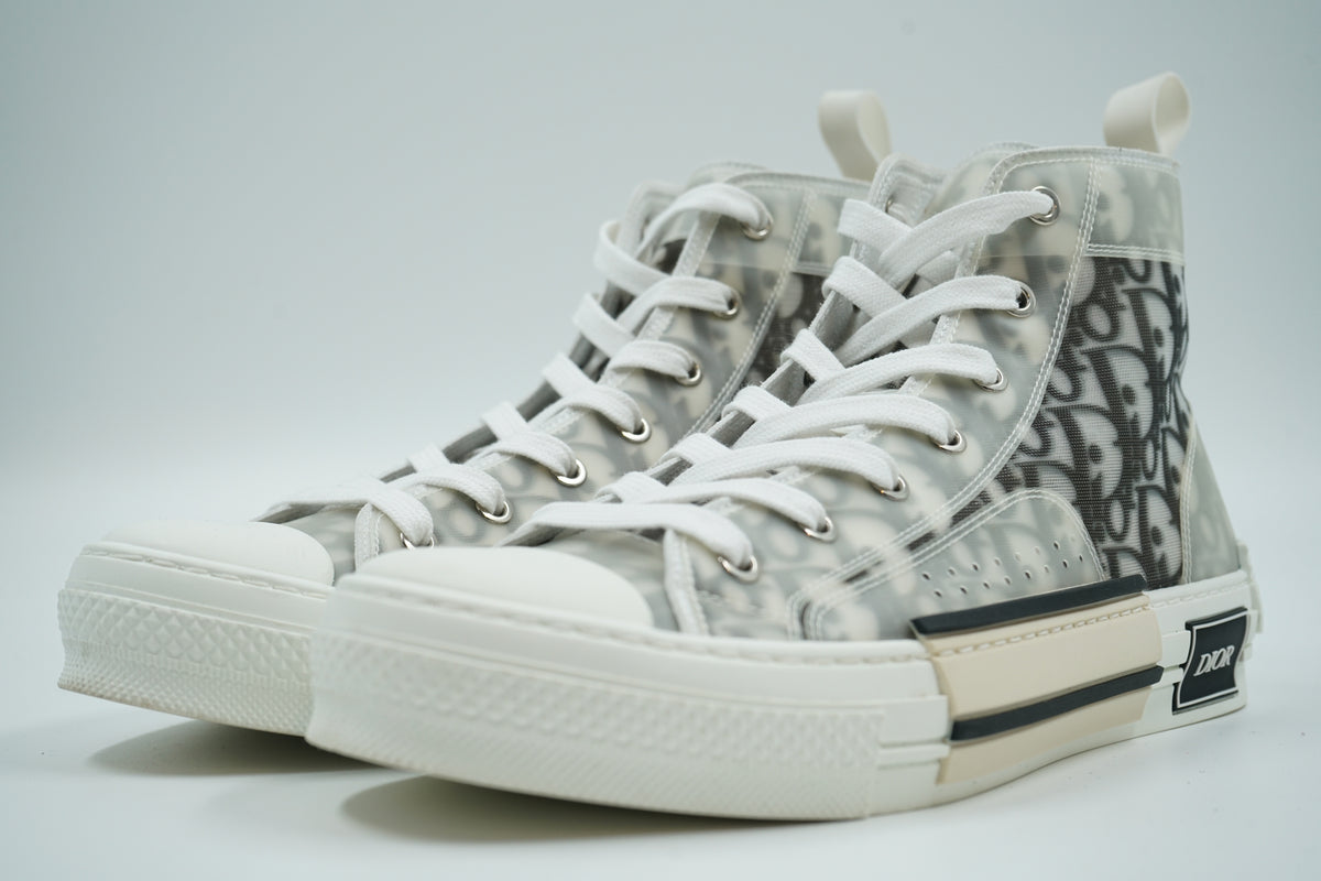 Pair of pre-owned Dior B23 high-top sneakers in white and black Dior Oblique canvas, front angle