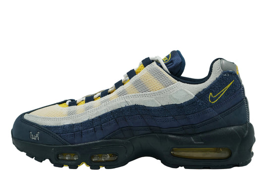 Eric Koston x Nike SB Air Max 95 in navy suede and grey mesh with yellow details and Thai Nike script at toe, side view