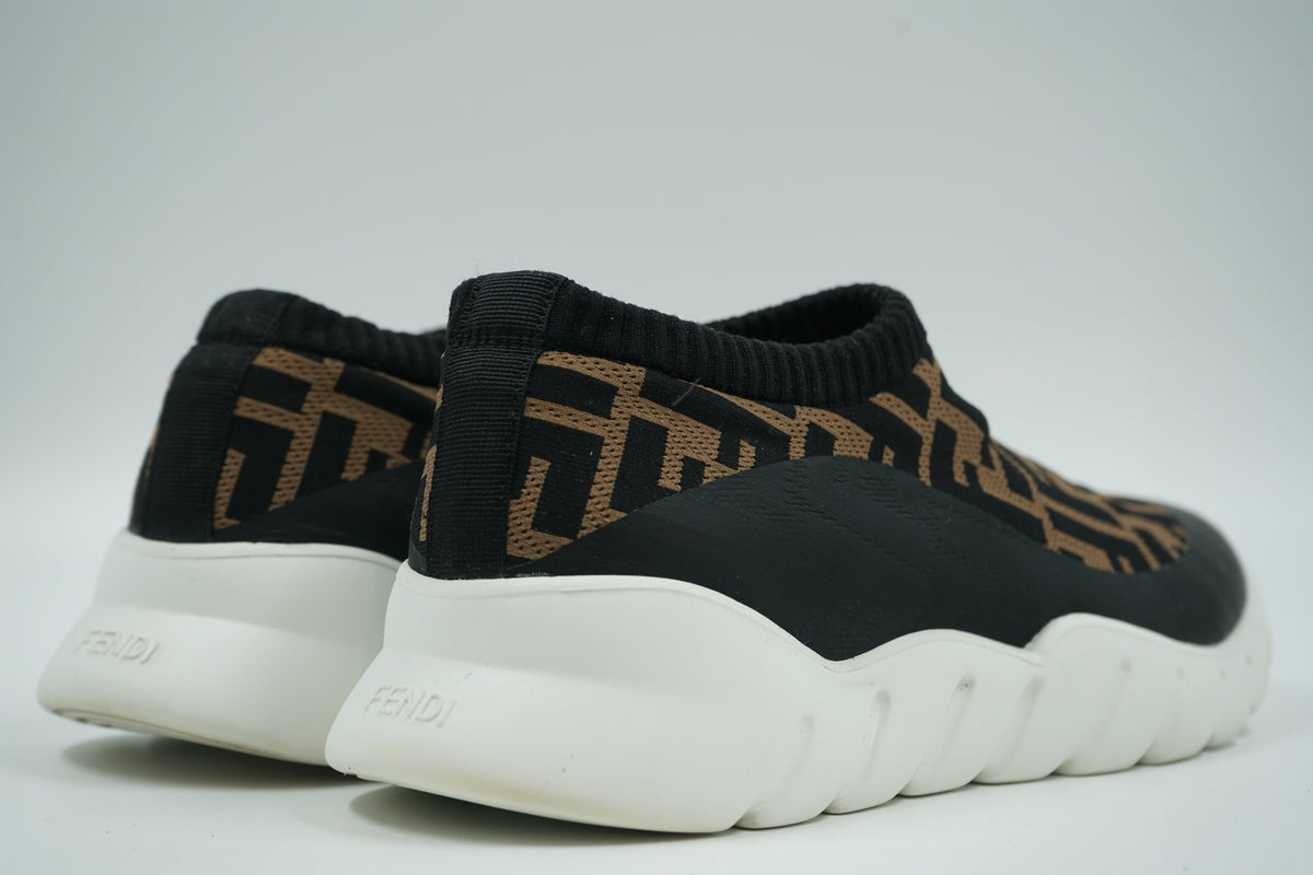 Pair of pre-owned Fendi slip-on sock sneakers in FF logo knit, back view with embossed Fendi heel logo