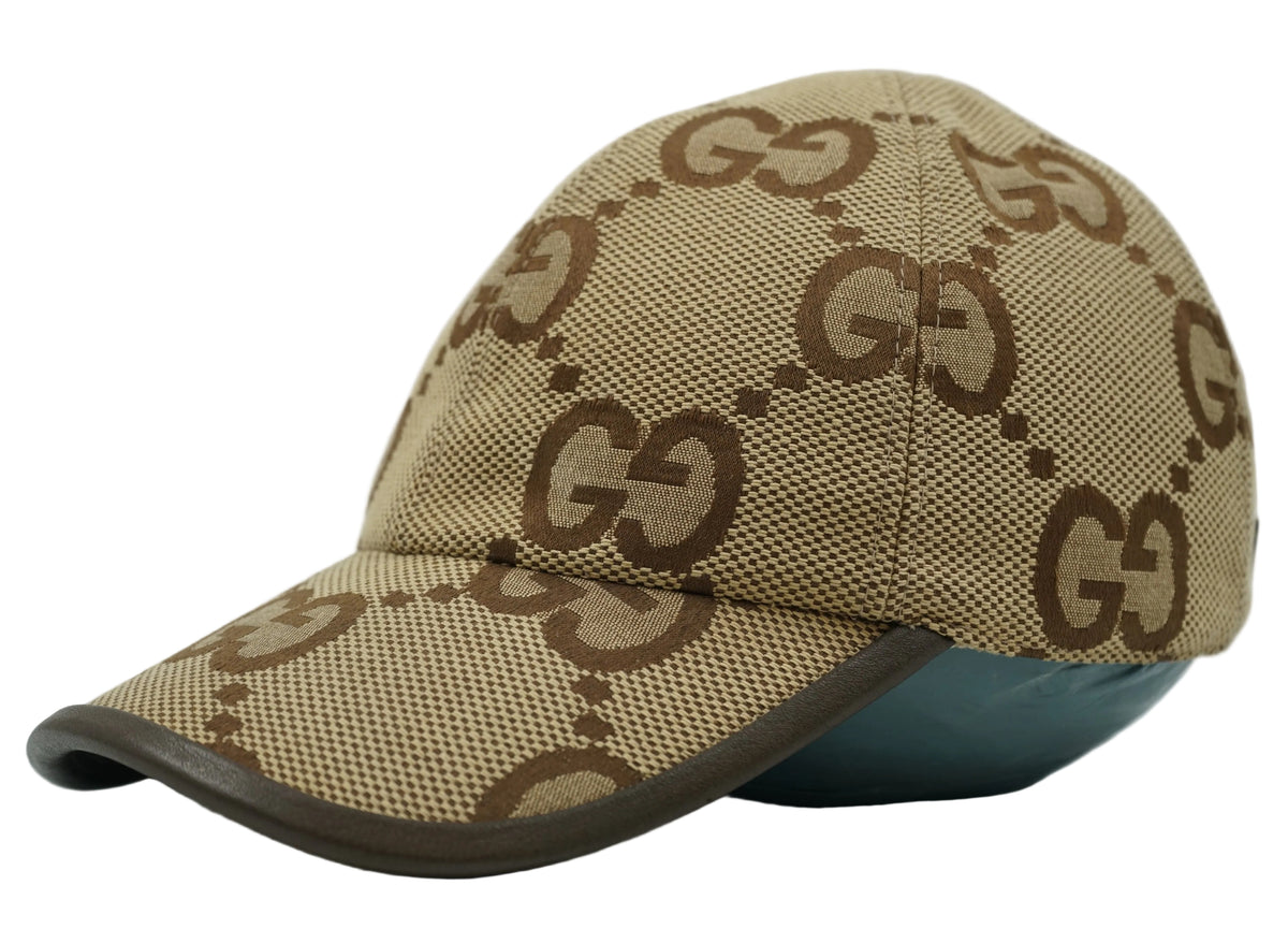 Gucci Jumbo GG canvas baseball cap in beige and brown with leather-trimmed peak, side view