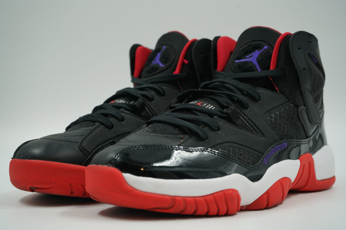 Pair of pre-owned Jordan Jumpman Two Trey in black patent leather with purple Jumpman tongue, front view