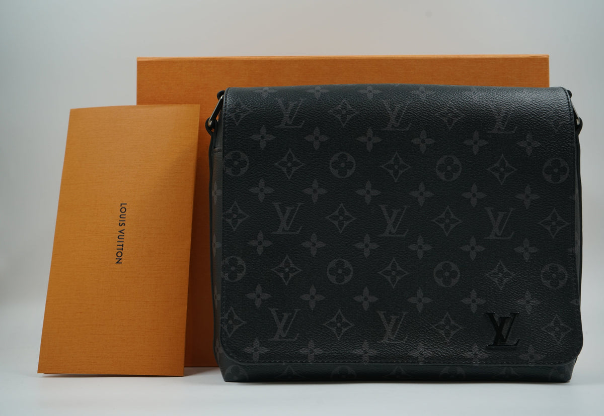 Pre-owned Louis Vuitton District messenger in Monogram Eclipse with original orange LV box and envelope
