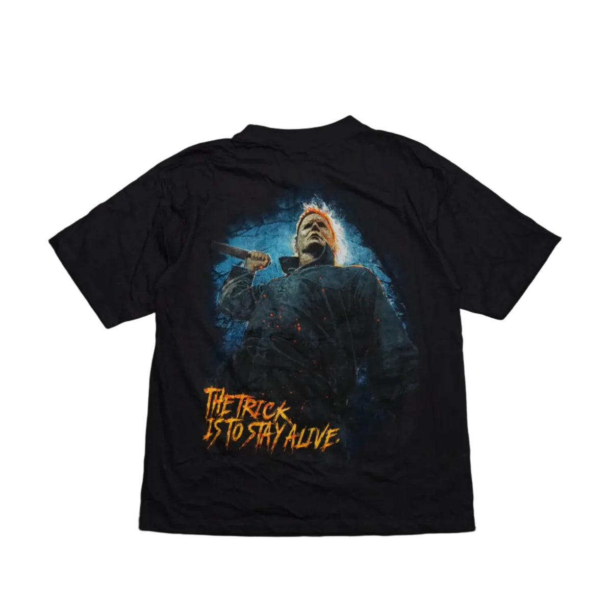 Black Michael Myers Halloween graphic T-shirt with knife-wielding figure and The Trick Is To Stay Alive back print