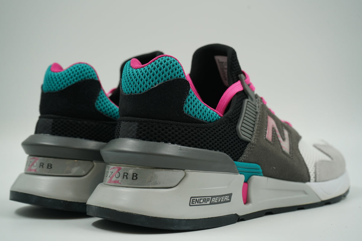 Pair of pre-owned New Balance 997 Sport Castlerock Amazonite, back view with ABZORB heel window
