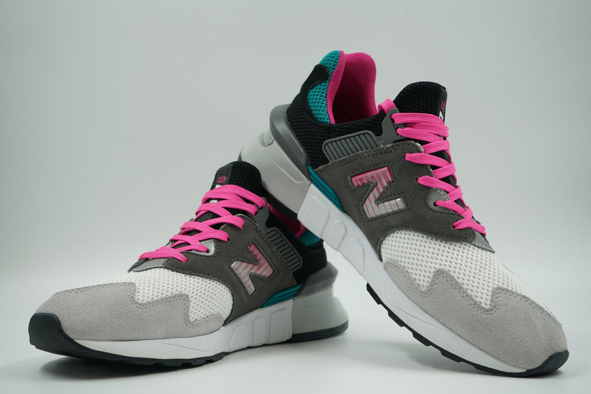 Pair of pre-owned New Balance 997 Sport Castlerock Amazonite, stacked view showing the inner sides