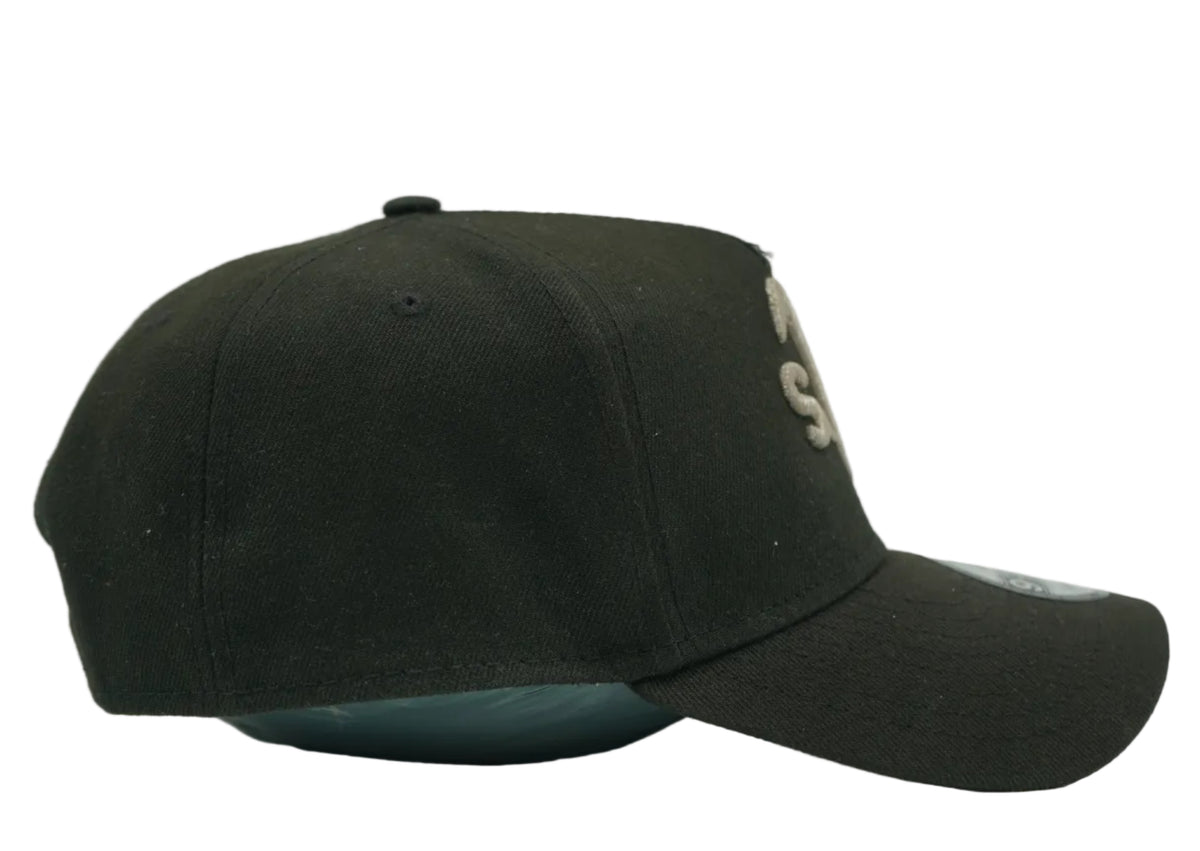 Pre-owned New Era 9FORTY A-Frame cap in black with upside-down Athletics logo, right side view