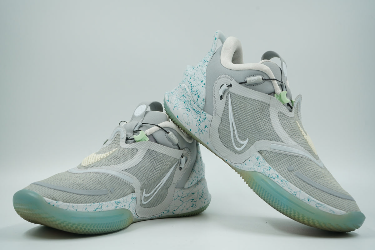 Pre-owned pair of Nike Adapt BB 2.0 Mag in grey mesh with teal splatter midsole and icy sole, side view
