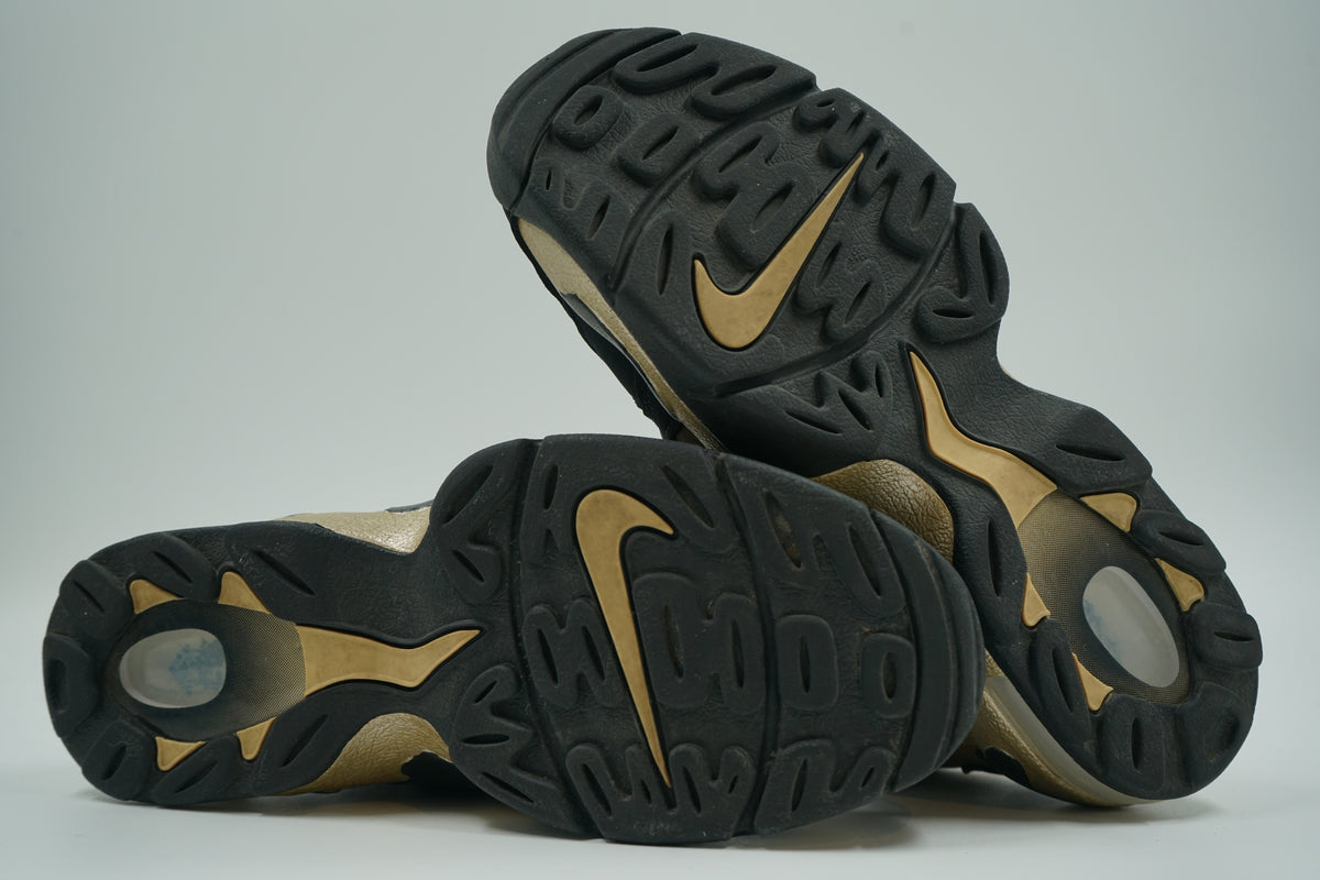 Pre-owned Nike Air DT Max 96 in black and gold, outsole view with gold Swoosh and visible Air heel window
