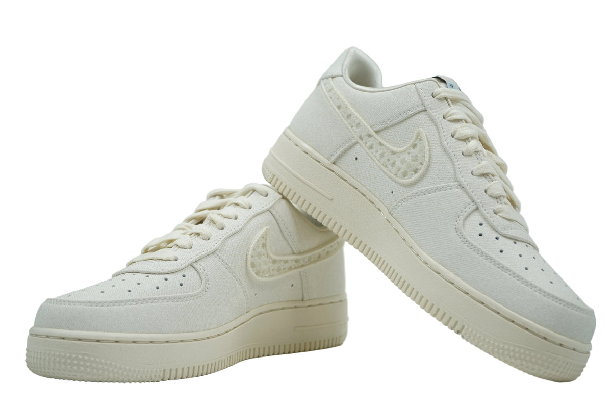 Pair of brand new Nike Air Force 1 Low in sail canvas with textured beaded Swoosh and cream midsole