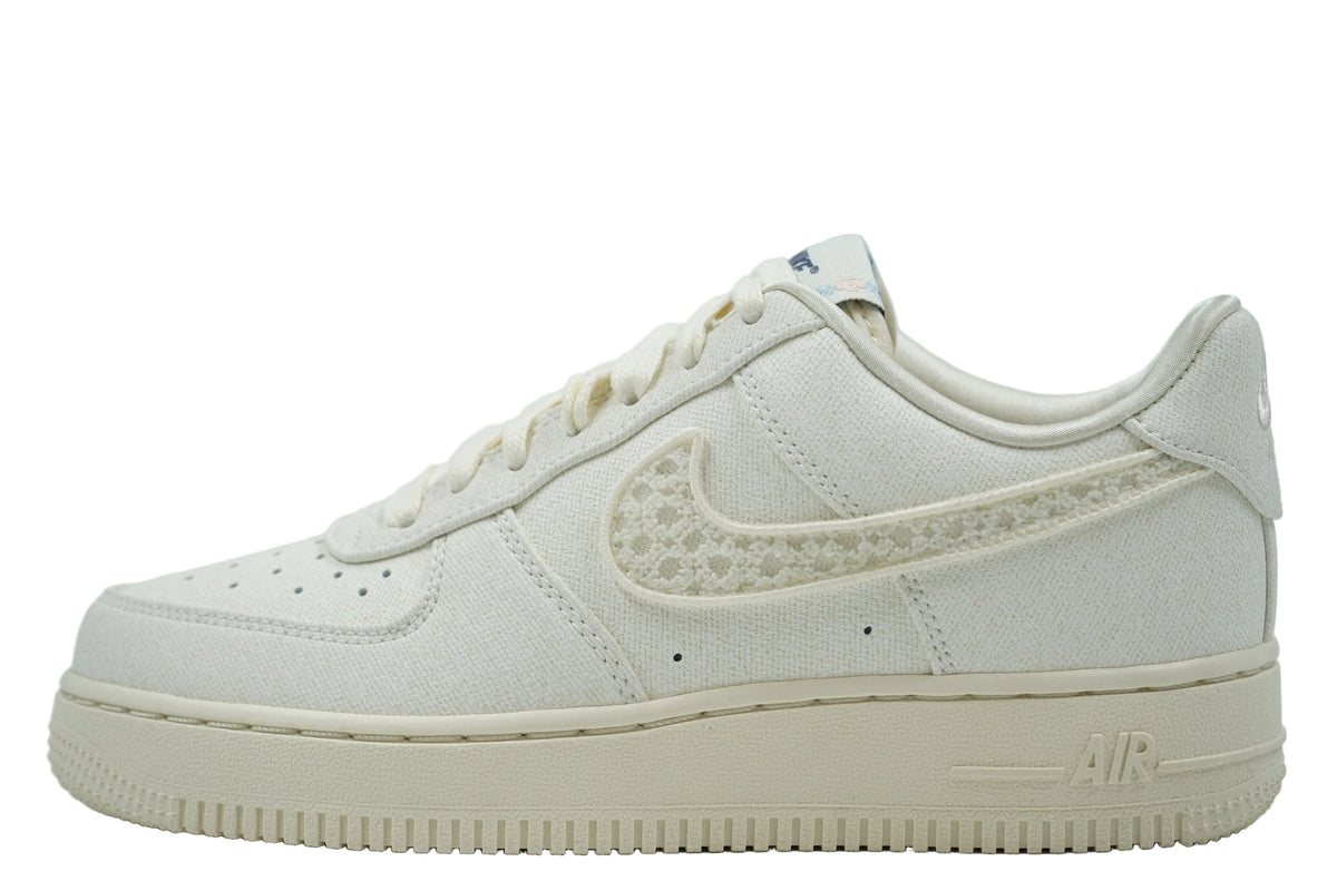 Brand new Nike Air Force 1 Low in sail canvas with textured beaded Swoosh and cream sole, side view