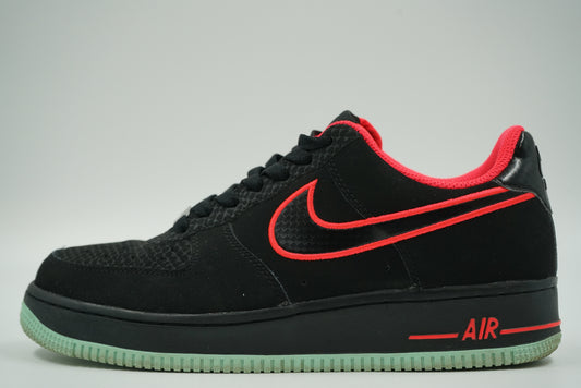 Pre-owned Nike Air Force 1 Low Yeezy in black nubuck with Solar Red Swoosh and glow sole, side view