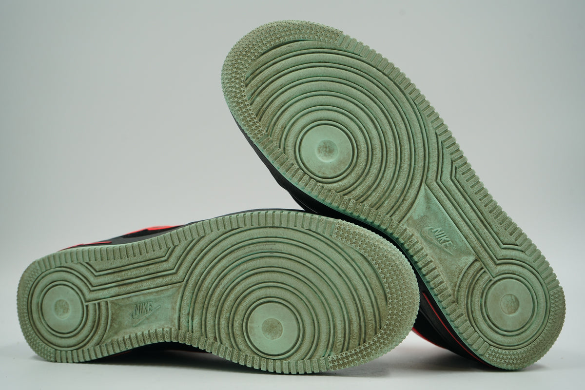 Pre-owned Nike Air Force 1 Low Yeezy, glow-in-the-dark green outsole view with Nike logo tread