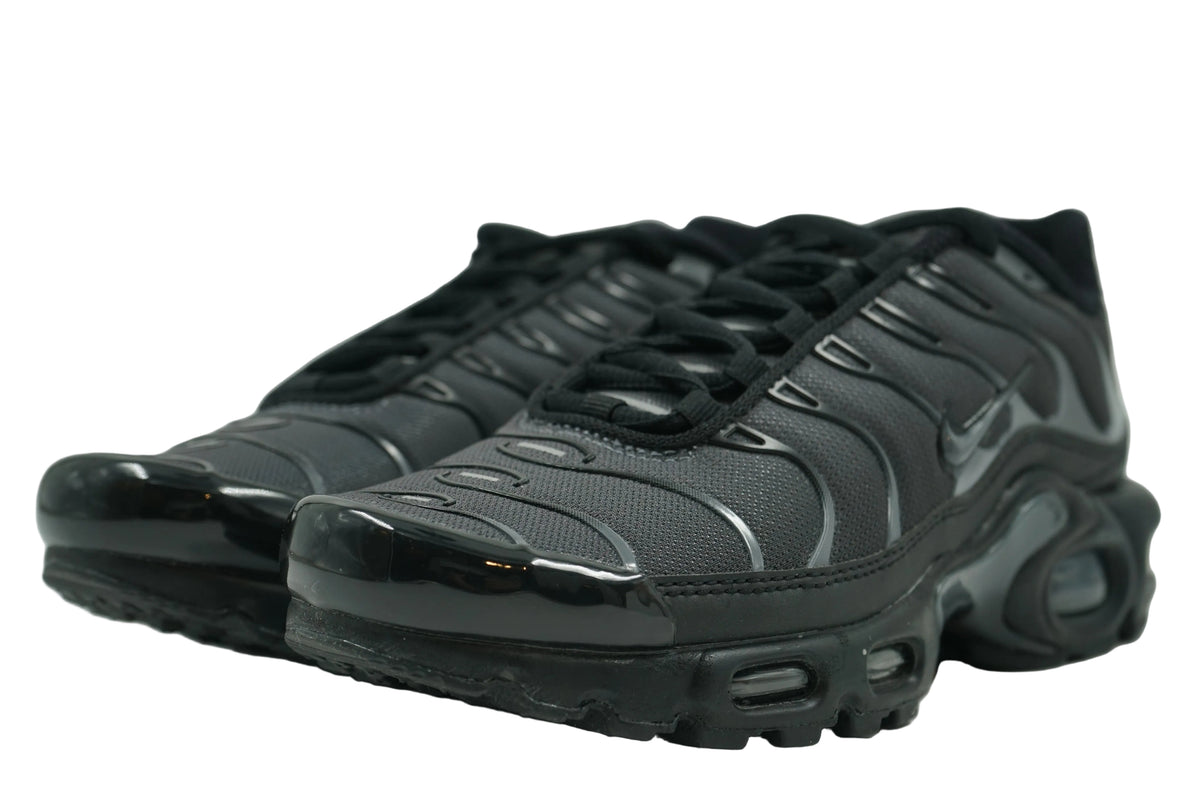 Pair of brand new Nike Air Max Plus TN in black and dark grey with black laces, front view