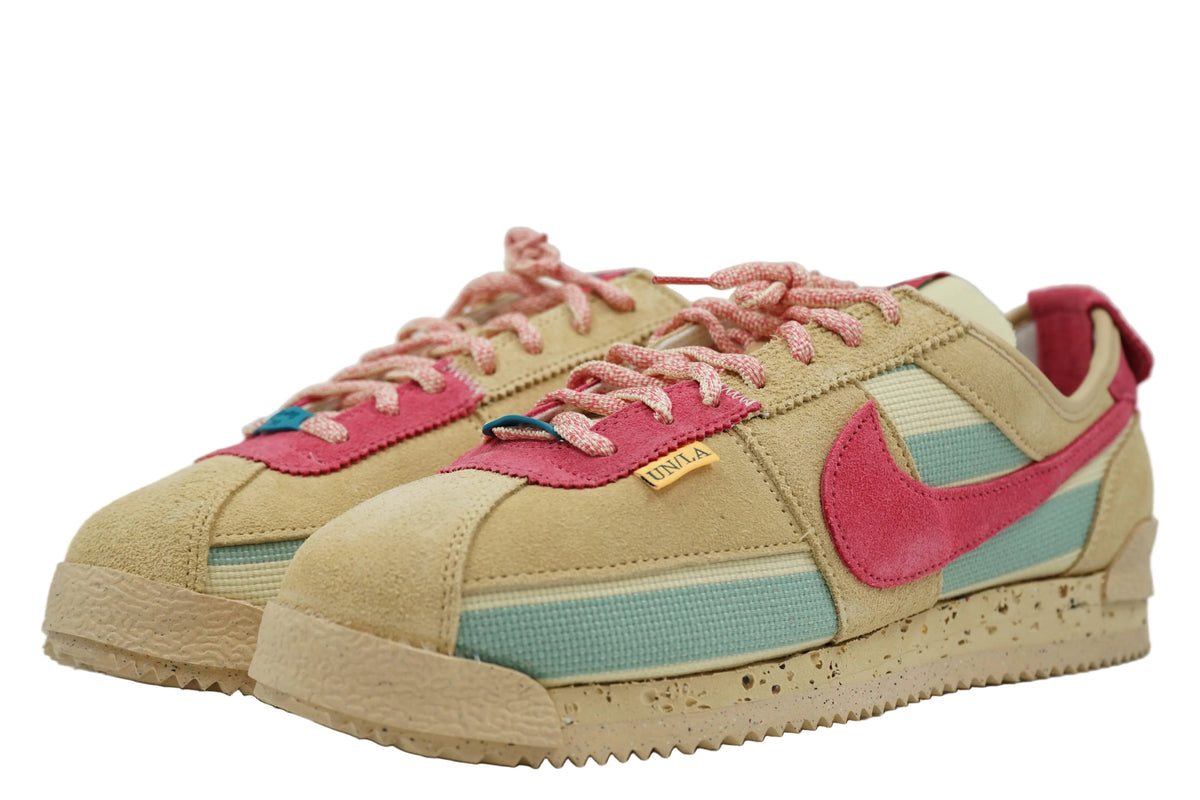Brand new Nike Cortez SP Union Sesame, front view with pink laces and UN/LA tab