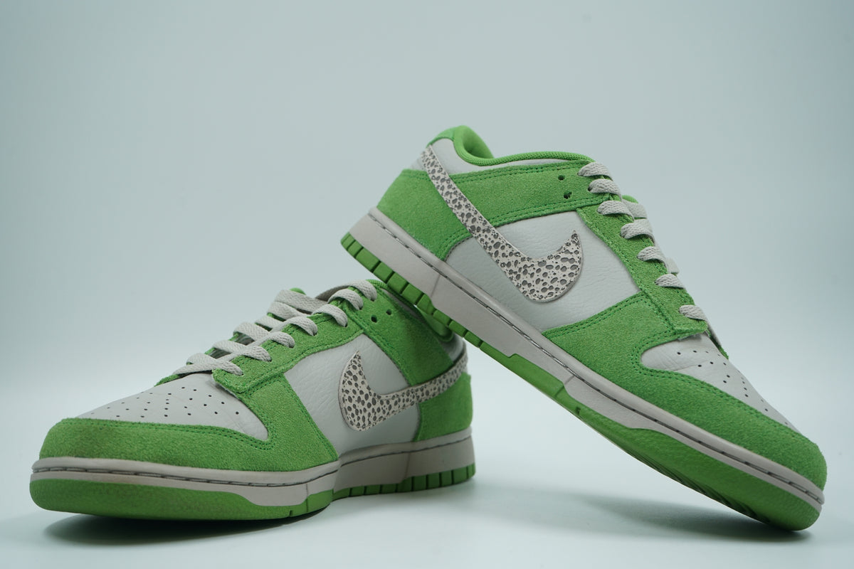 Pair of pre-owned Nike Dunk Low Safari Swoosh in green suede and grey leather, stacked view of inner sides