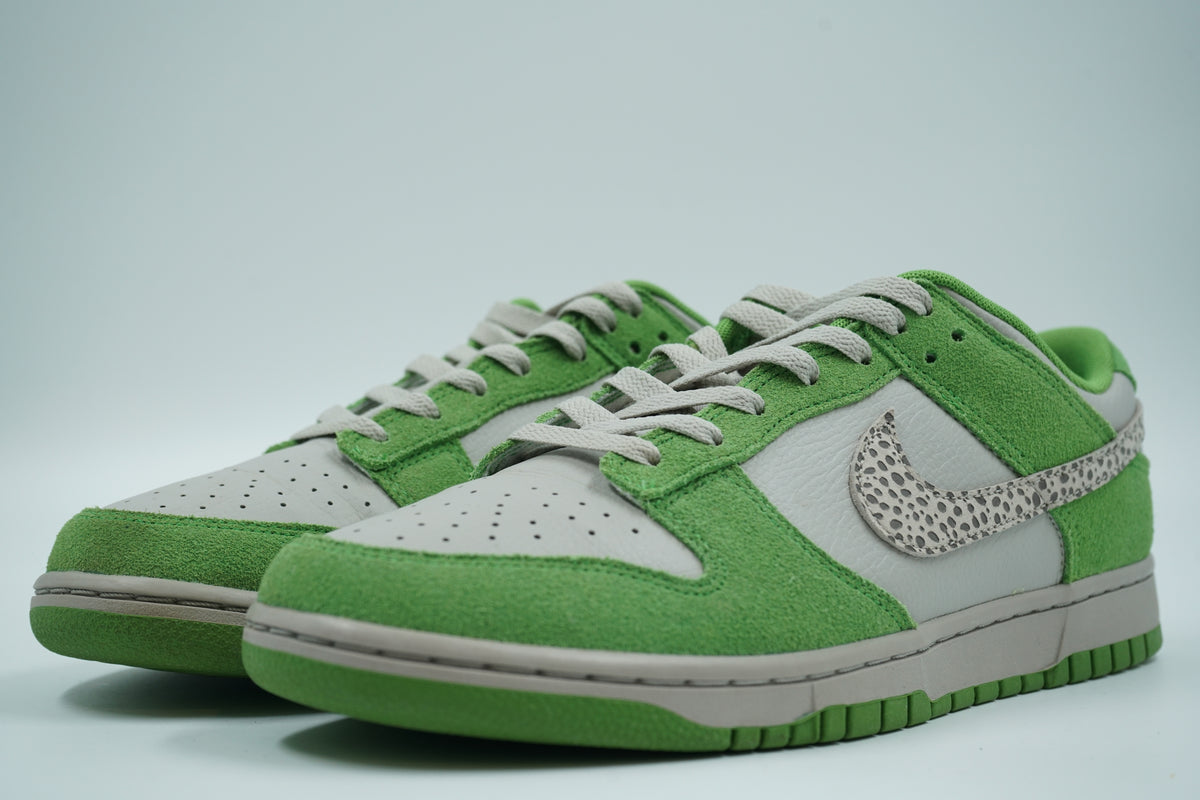 Pair of pre-owned Nike Dunk Low Safari Swoosh in green suede and grey leather, front angle view