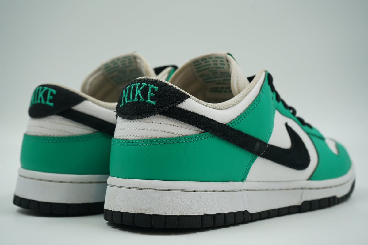 Pre-owned Nike Dunk Low in Stadium Green, white and black, back view with green embroidered Nike heel tab